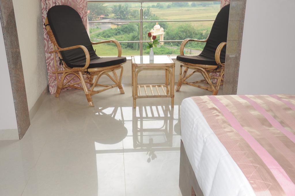Boshan Hotels Mapusa Oda fotoğraf