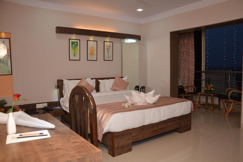 Boshan Hotels Mapusa Oda fotoğraf